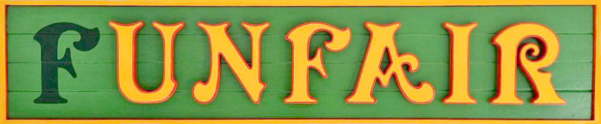 Green wooden sign with fUNFAIR in yellow letters