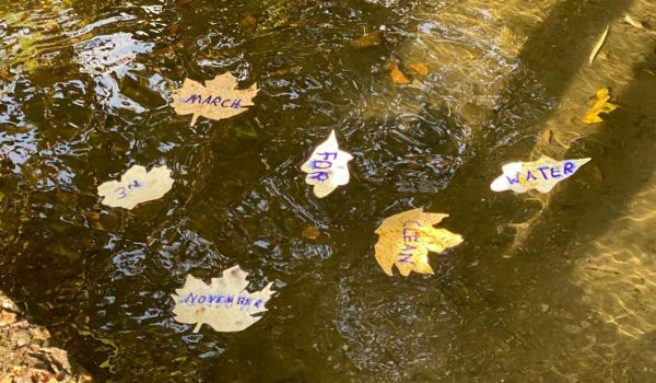 March for Water leaves on a river